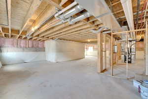 Below grade area featuring heating unit