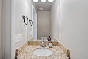 Half bathroom with vanity