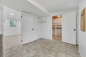Below grade area with baseboards and recessed lighting