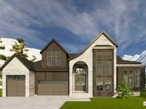 French provincial home featuring stone siding, a garage, decorative driveway, and a front lawn