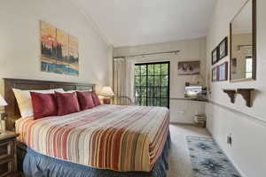 Bedroom with carpet and baseboards