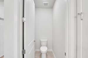 Full bath featuring tile patterned floors and tiled shower