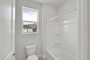 Full bathroom featuring a mountain view and washtub / shower combination