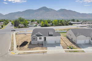View of mountain backdrop with nearby suburban area