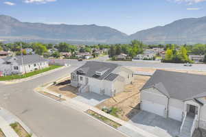 Aerial view of residential area with a mountain backdrop