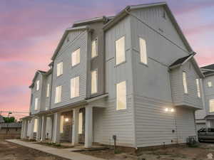 View of front of property featuring a porch and board and batten siding