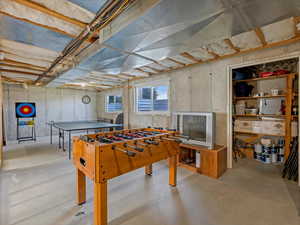 Rec room with finished concrete floors