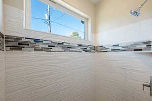 Bathroom view of a tile shower