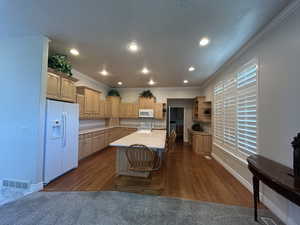 Kitchen with laundry room straight ahead