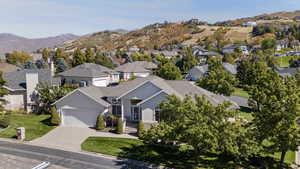 Aerial view of residential area with mountains