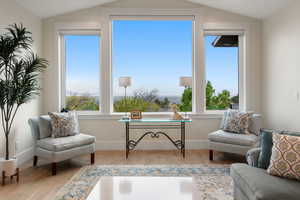 Sitting room featuring wood finished floors and baseboards