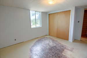 Unfurnished bedroom featuring a closet