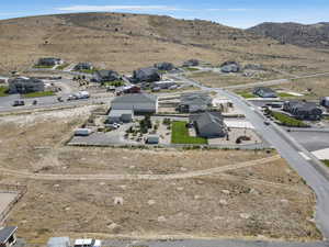 Aerial view of residential area featuring mountains