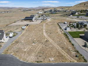 Aerial view of residential area with a mountain backdrop