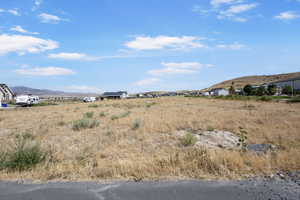 View of yard with a mountain view