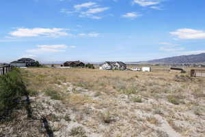 View of yard with a mountain view