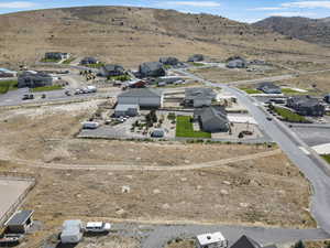 Aerial view of residential area with a mountainous background