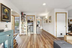 Interior space with wood finished floors and baseboards