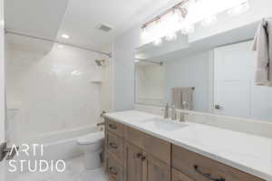 Bathroom with vanity, shower / bath combination, recessed lighting, and marble finish flooring