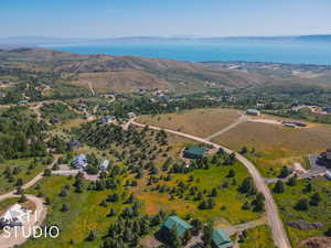 Aerial overview of property's location with a nearby body of water