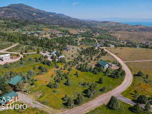 Aerial overview of property's location featuring mountains