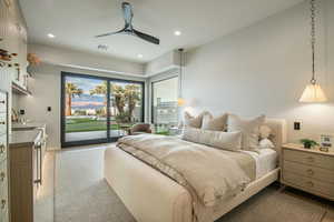 Bedroom featuring access to outside, wood finished floors, recessed lighting, and a ceiling fan