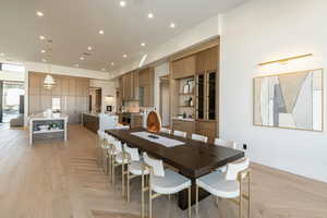 Dining room featuring recessed lighting and light wood-style floors