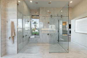 Full bathroom featuring a stall shower and recessed lighting
