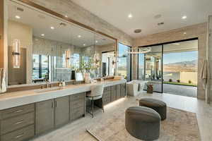Full bathroom featuring recessed lighting, vanity, a freestanding tub, and an enclosed shower