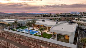 Bird's eye view of a pool and a mountain backdrop