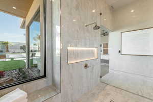 Bathroom featuring a shower, ceiling fan, recessed lighting, and marble finish floors