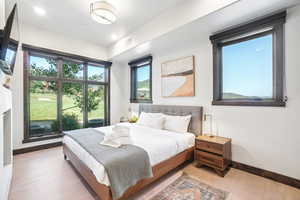 Bedroom featuring light wood-style floors and recessed lighting