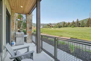 Balcony featuring area for grilling