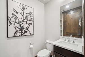 Bathroom featuring toilet and vanity