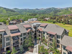 Aerial view of residential area with mountains