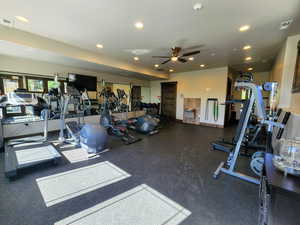 Exercise room with recessed lighting and ceiling fan