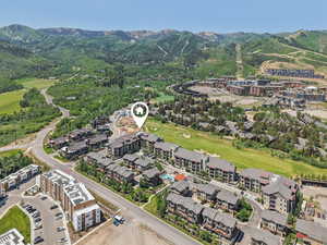 Aerial overview of property's location featuring mountains