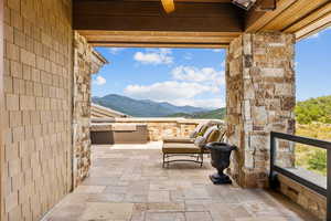 View of patio with a mountain view