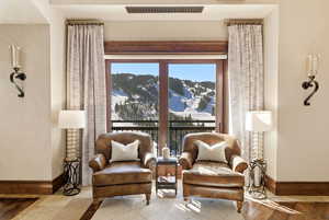 Living area featuring baseboards