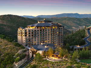 View of subject property featuring mountains