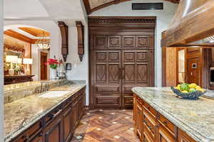 Bathroom with vanity and crown molding