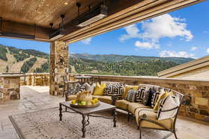 View of patio / terrace featuring outdoor lounge area and a mountain view