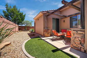 Fenced backyard featuring a patio