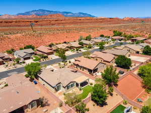 Aerial view of residential area with mountains and a desert landscape