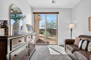 Living room featuring carpet floors