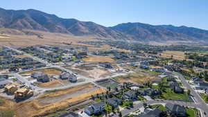 View of property location with nearby suburban area and a mountain backdrop