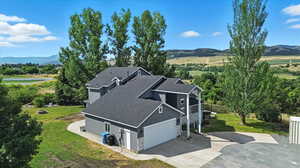 View from above of property featuring a mountainous background