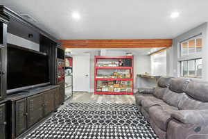 Living area featuring recessed lighting and light wood finished floors