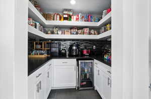 Storage area with beverage cooler