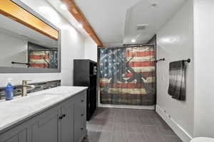 Full bath featuring vanity, recessed lighting, and curtained shower